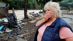 مصرع اكثر من 180 شخصا التفاصيل الكامله لفيضانات اوروبا صور وفيديو