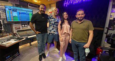 Bossi finishes recording its new song I sell the world by signing Ahmed Adel