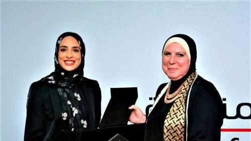 The Minister of Commerce honors the Olympic Champion Ferial Ashraf and its families