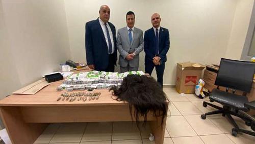 Thwarting an attempt to smuggle drugs human drugs and natural hair at Cairo Airport
