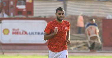 Mossimani contains Hossam Hassan after the Farko match