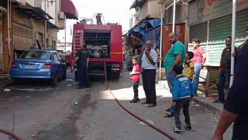 Control an apartment fire in the printing area in Giza without any injuries
