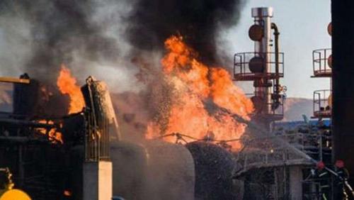 URGENT Civil Defense teams are trying to extinguish the huge fire in Tehrans oil refinery