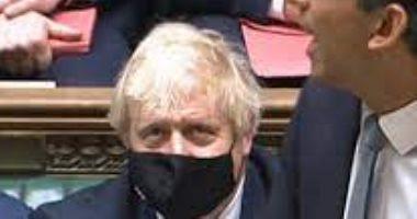 Johnson wears a mask inside the British parliament for the first time months