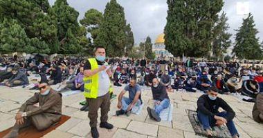 The Israeli occupation forces storm the AlAqsa Mosque and assault the worshipers