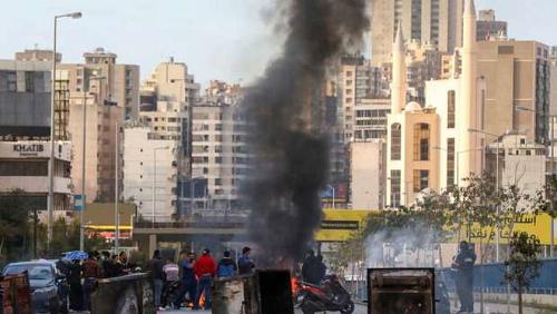 Lebanese protesters attack the building of the Ministry of Economy in Beirut