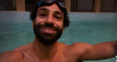 Mohammed Salah in the swimming pool after winning Milan in the Champions League