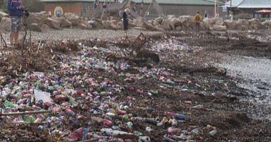 Waste covers Marseille beaches after floods swept the city video
