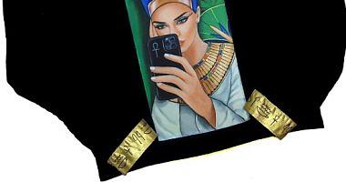 Ahmed feet modern clothes with pharaonic artists on fashion suit every era