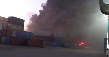 Extinguishing a fire store at the port of West Port Said Photos