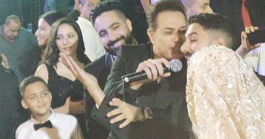 Hakim singer participates in reviving the wedding son of the brother of Hamid Al Sharahim