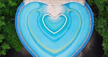 Design a heartshaped swimming pool to attract visitors in south China photos