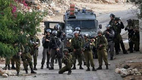Israeli occupation forces arrest 9 Palestinians from the West Bank