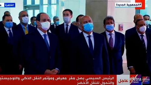 URGENT Sisi walks around the exhibition and conference of intelligent transport and logistics
