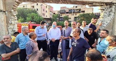 Photos of Cairo Governor follow fire extinguishing fire from a timber stores in Sharia