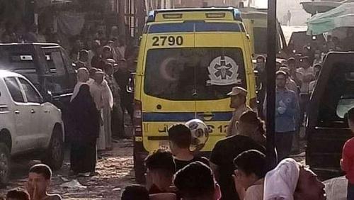 The moment of moving the bodies of the victims of Fayoum massacre with ambulance and people shocking video
