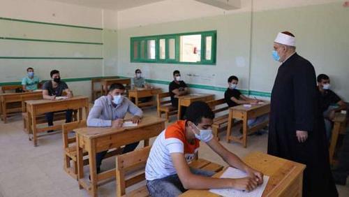 The students of the literary section perform the geography exam in Al Azhar secondary school today