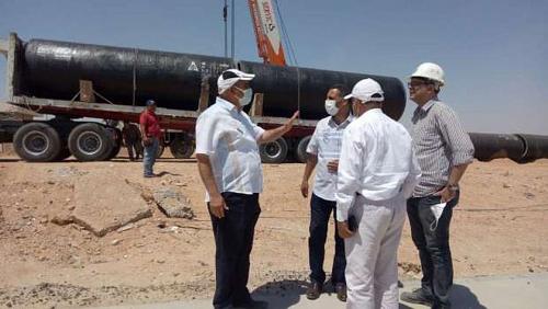 Housing officials are inspecting the workflow project in a new water station project in Badr City