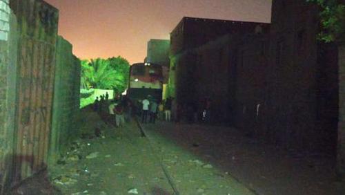 Children cars and homes mess about Helwan train rods