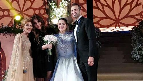 4 shots from the wedding of the Golden Sham most notably the originality and singing Elissa