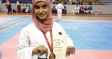 Heba the first champion of Karate from Mahamma in Assiut has challenged brain atrophy
