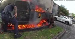 شرطيان امريكيان ينقذان رجلا من شاحنه محترقه فيديو وصور