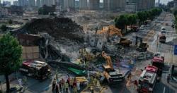 مصرع 9 اشخاص فى انهيار مبنى من 5 طوابق على حافله بكوريا الجنوبيه صور