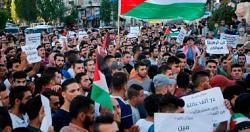 الاف الفلسطينيين يشاركون فى مسيره دعما للشرعيه ونصره للقدس والاسرى