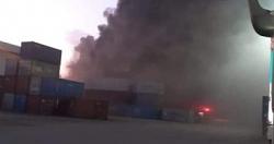 اخماد حريق مخزن بميناء غرب بورسعيد فيديو صور